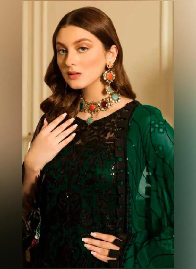 Appealing Dark Green color With Butterfly Net Base Salwar Kameez